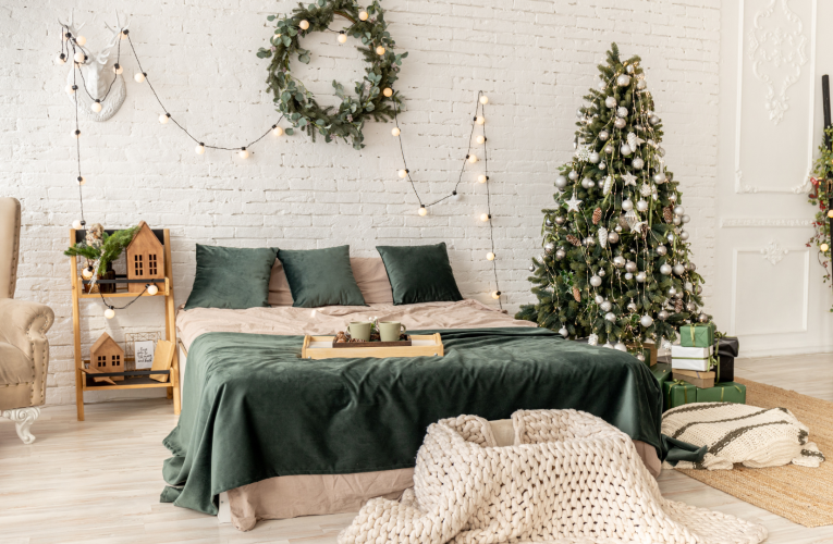 A cozy bedroom adorned with Christmas-themed tapestries and decorations.