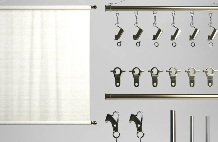 A collection of tapestry hanging hardware including rods, clips, and hooks on a clean background.